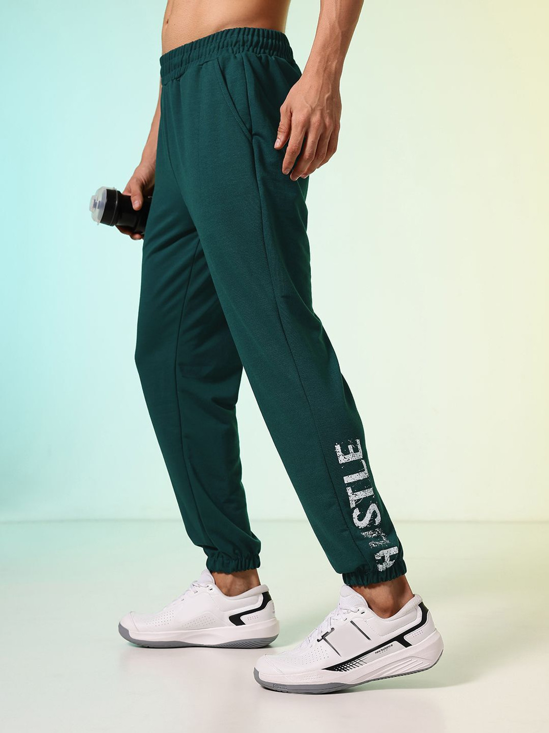 Image of HRX by Hrithik Roshan Solid Men Green Track Pants