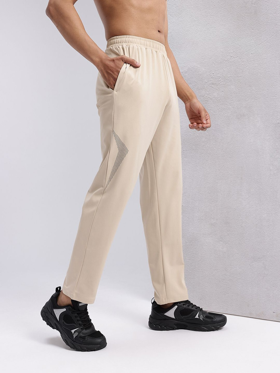 Image of HRX by Hrithik Roshan Graphic Print Men Beige Track Pants
