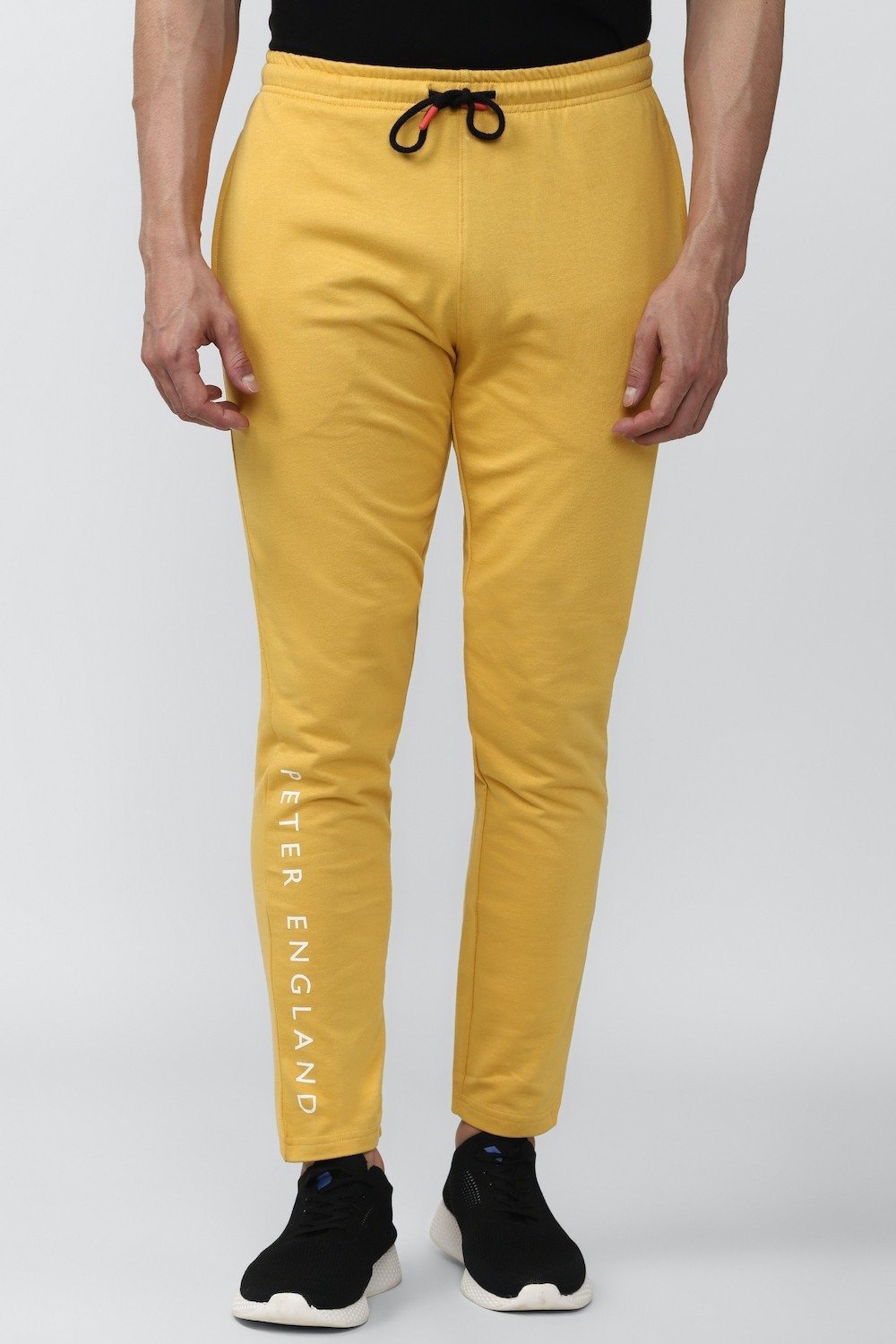 Image of PETER ENGLAND Solid Men Yellow Track Pants