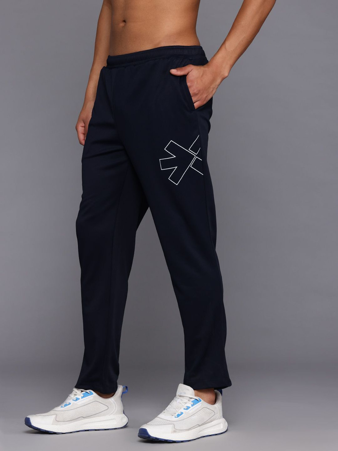 Image of HRX by Hrithik Roshan Striped Men Blue Track Pants