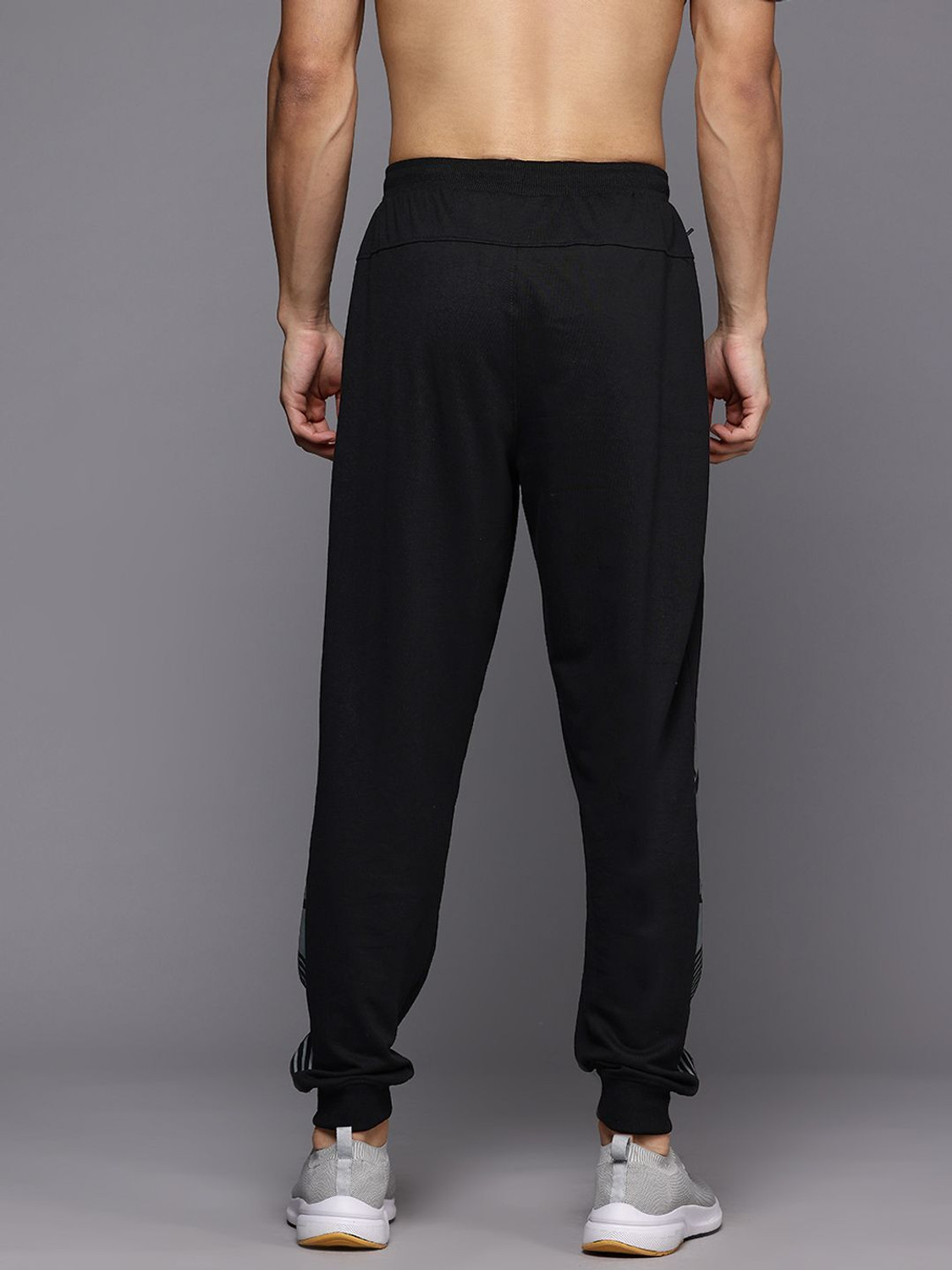 Image of HRX by Hrithik Roshan Printed Men Black Track Pants