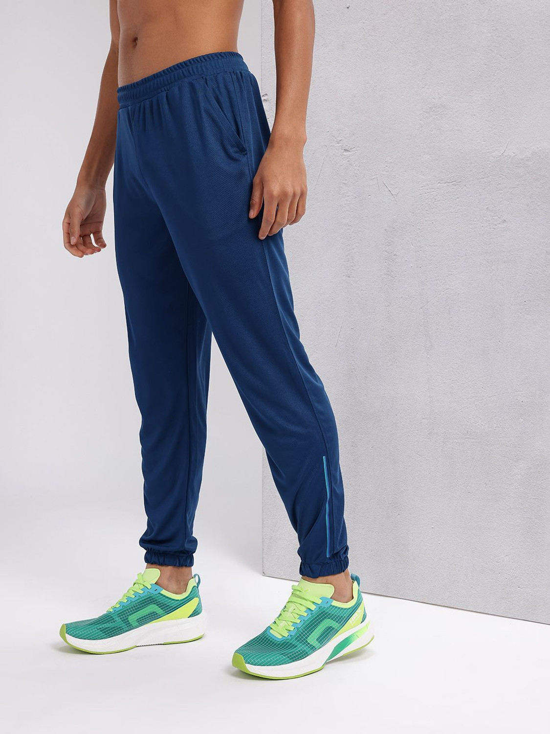 Image of HRX by Hrithik Roshan Solid Men Blue Track Pants