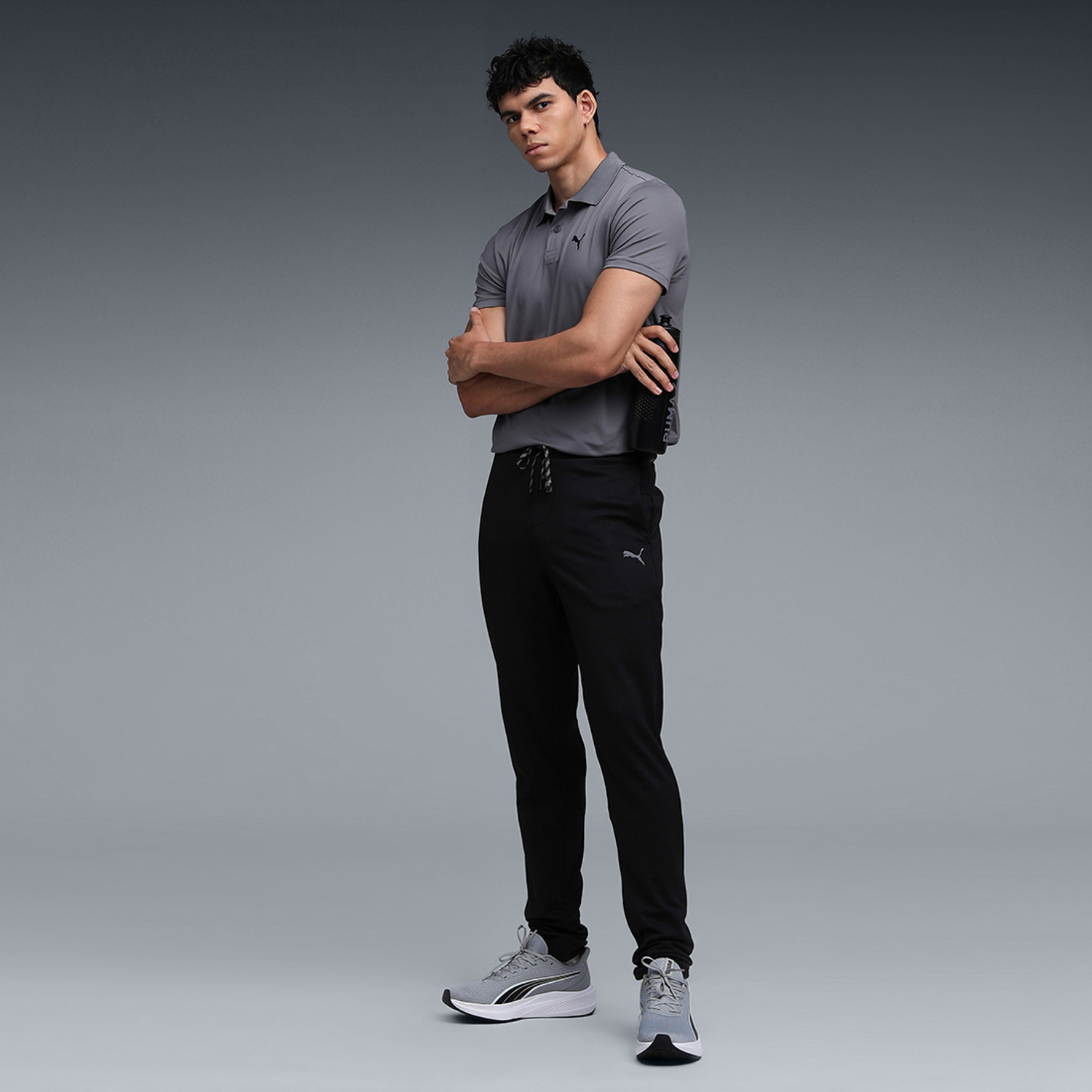 Image of PUMA Solid Men Black Track Pants