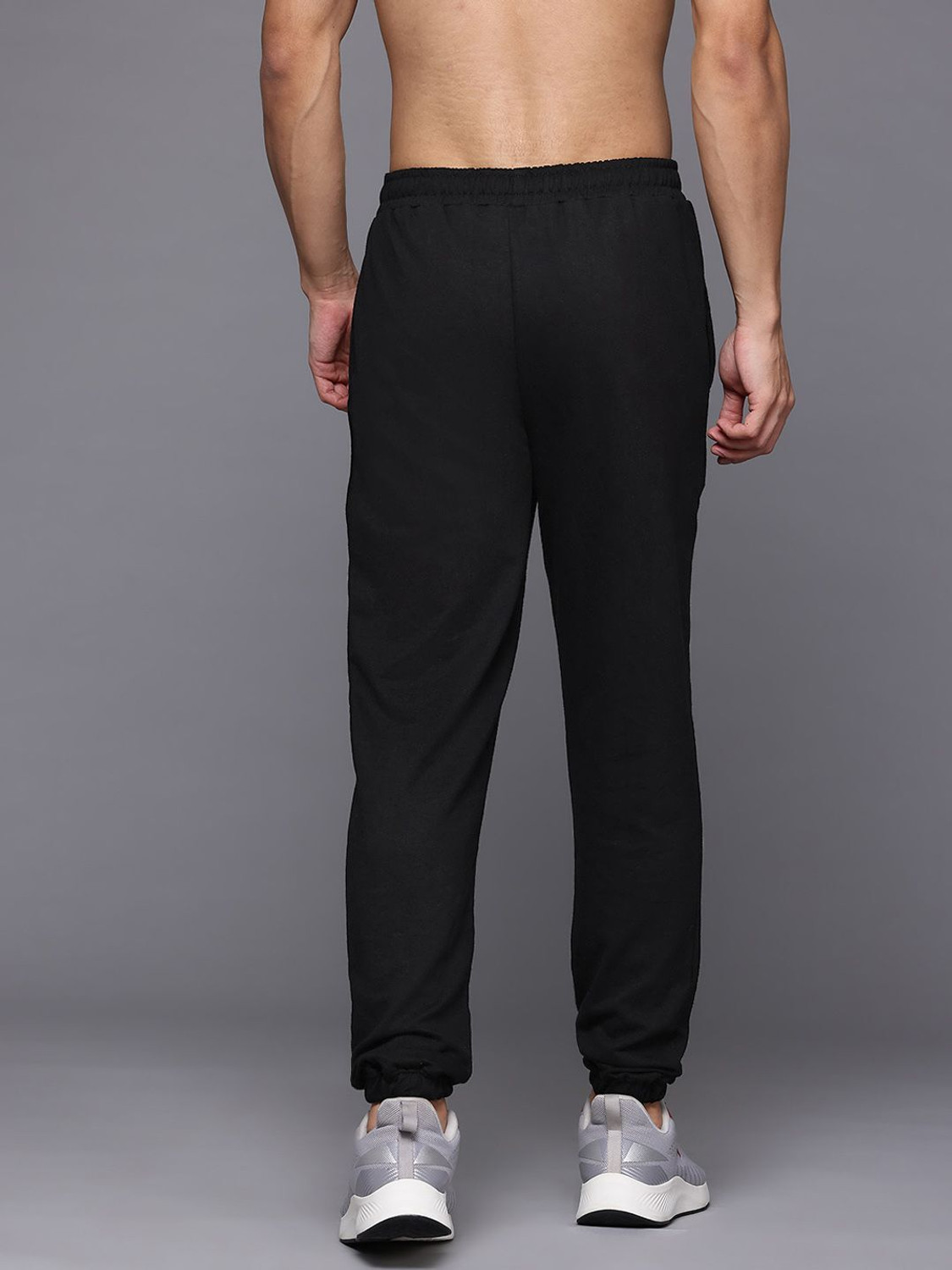 Image of HRX by Hrithik Roshan Solid Men Black Track Pants