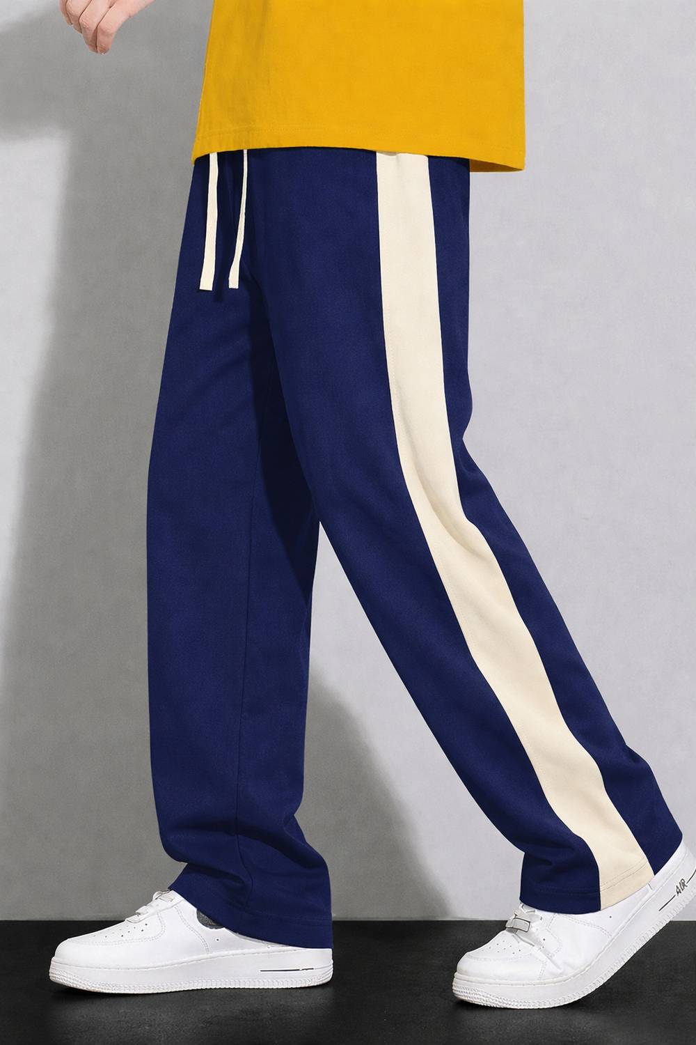 COMBRAIDED Men Blue Beige Track Pants - Image 1
