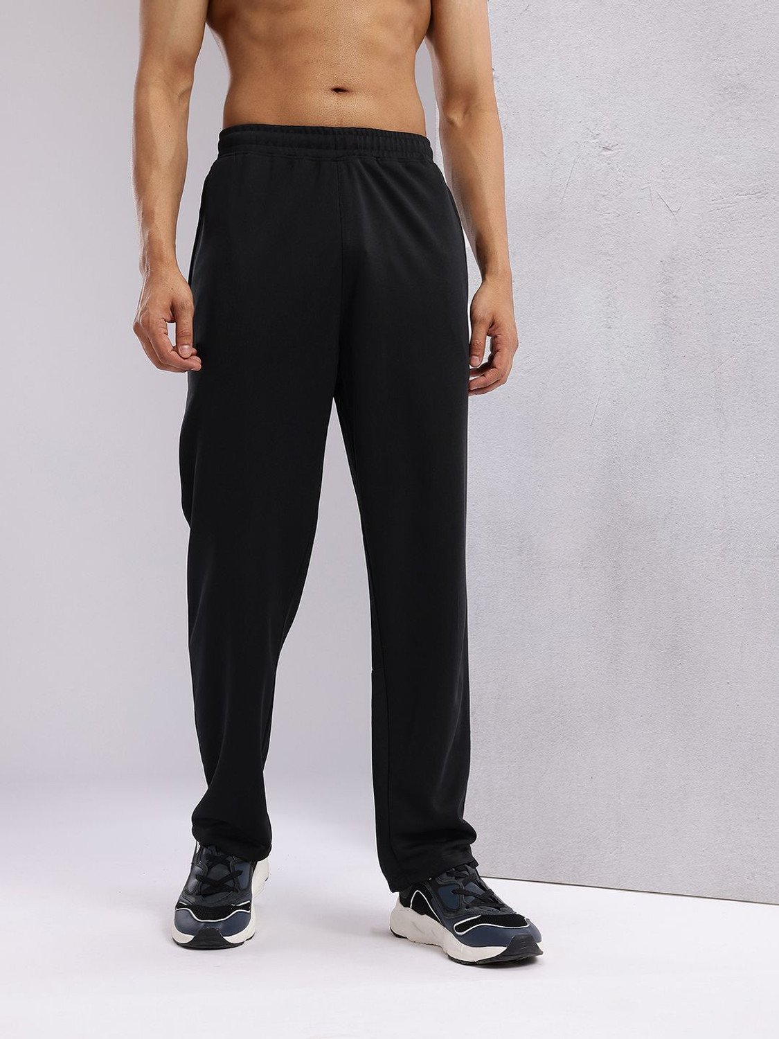Image of HRX by Hrithik Roshan Solid Men Black Track Pants