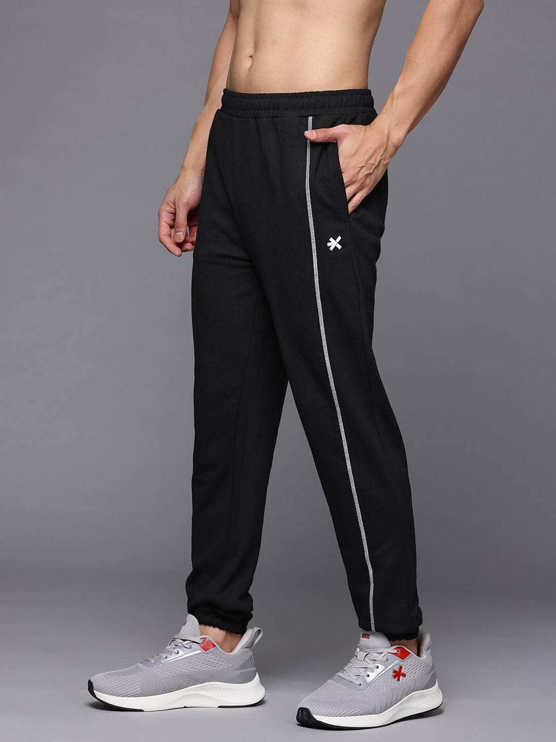 Image of HRX by Hrithik Roshan Solid Men Black Track Pants