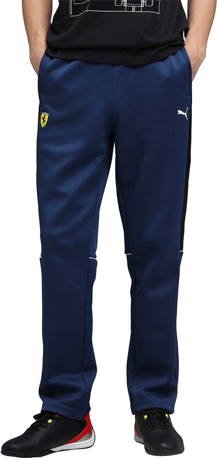 PUMA Solid Men Blue Track Pants