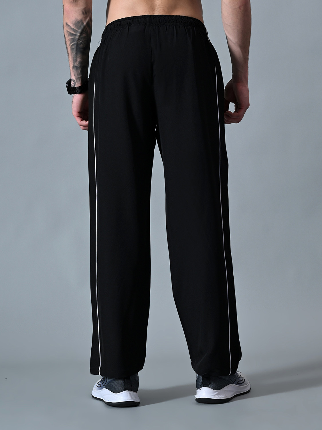 Image of HRX by Hrithik Roshan Striped Men Black Track Pants