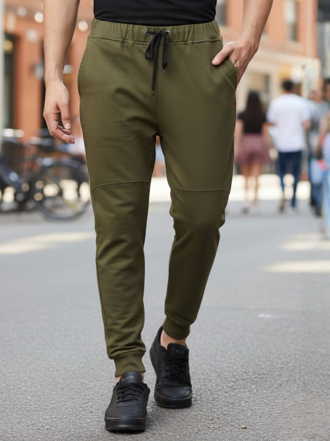 Image of RIGO Solid Men Green Track Pants