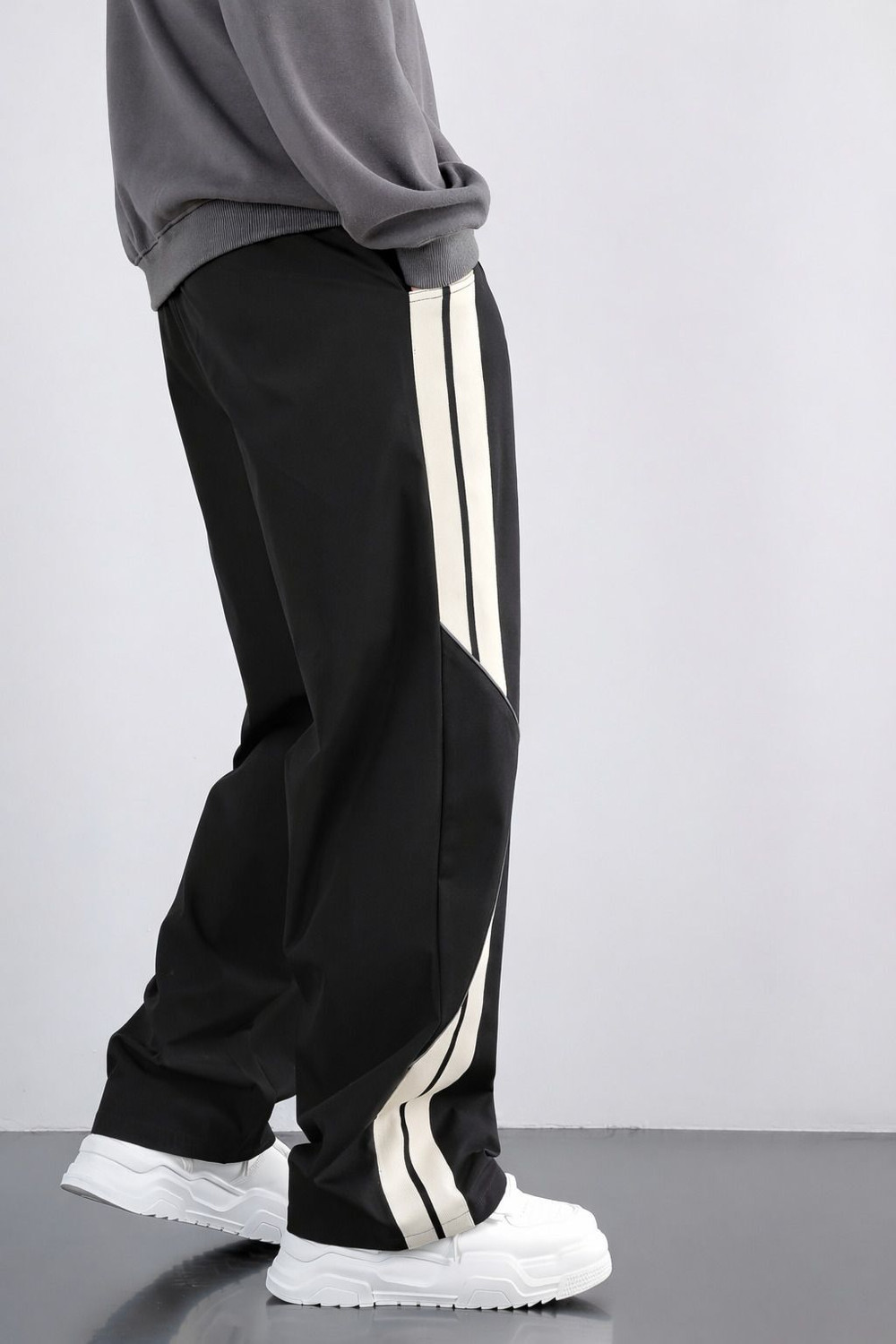 Image of JERKYN Striped Men Black Track Pants