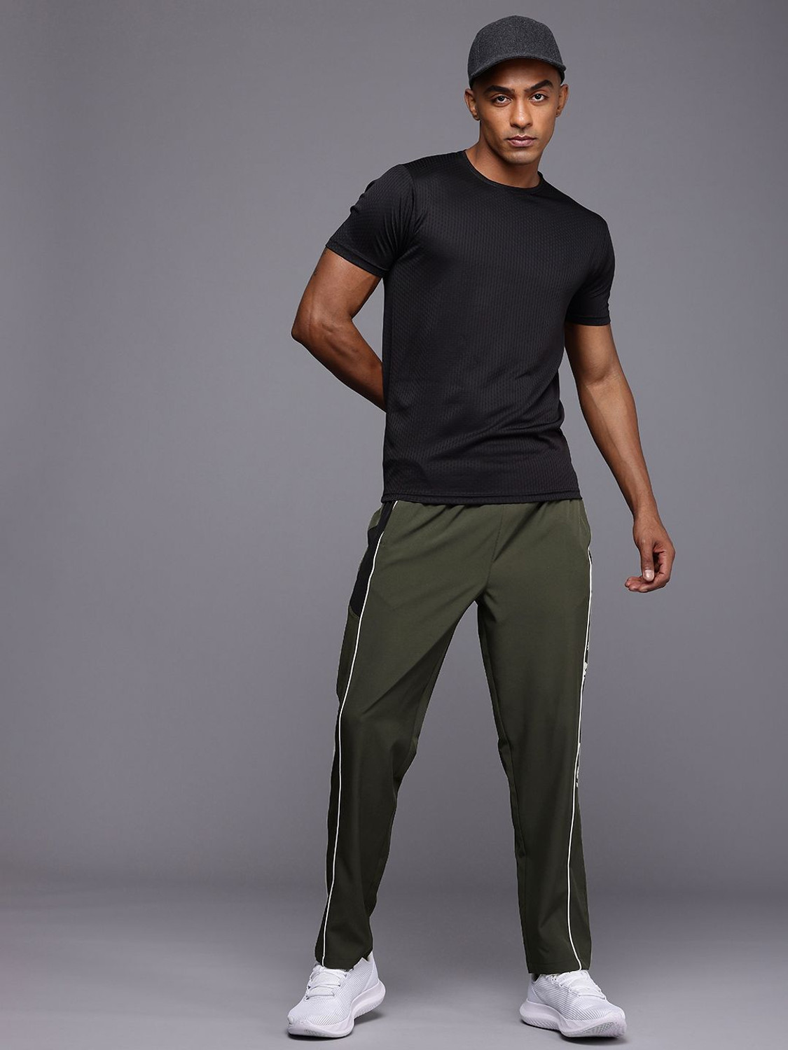 Image of HRX by Hrithik Roshan Striped Men Green Track Pants