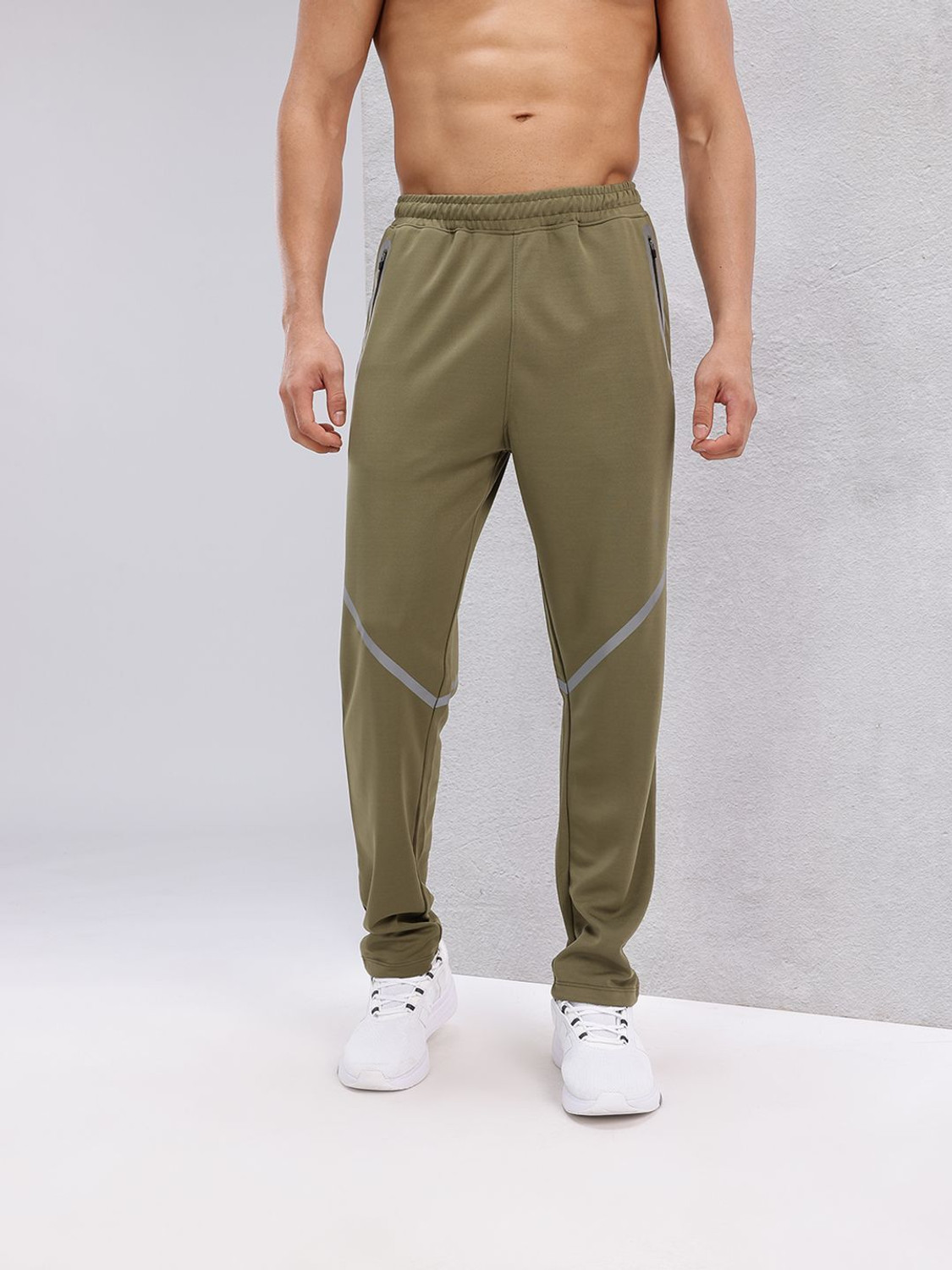 Image of HRX by Hrithik Roshan Solid Men Green Track Pants