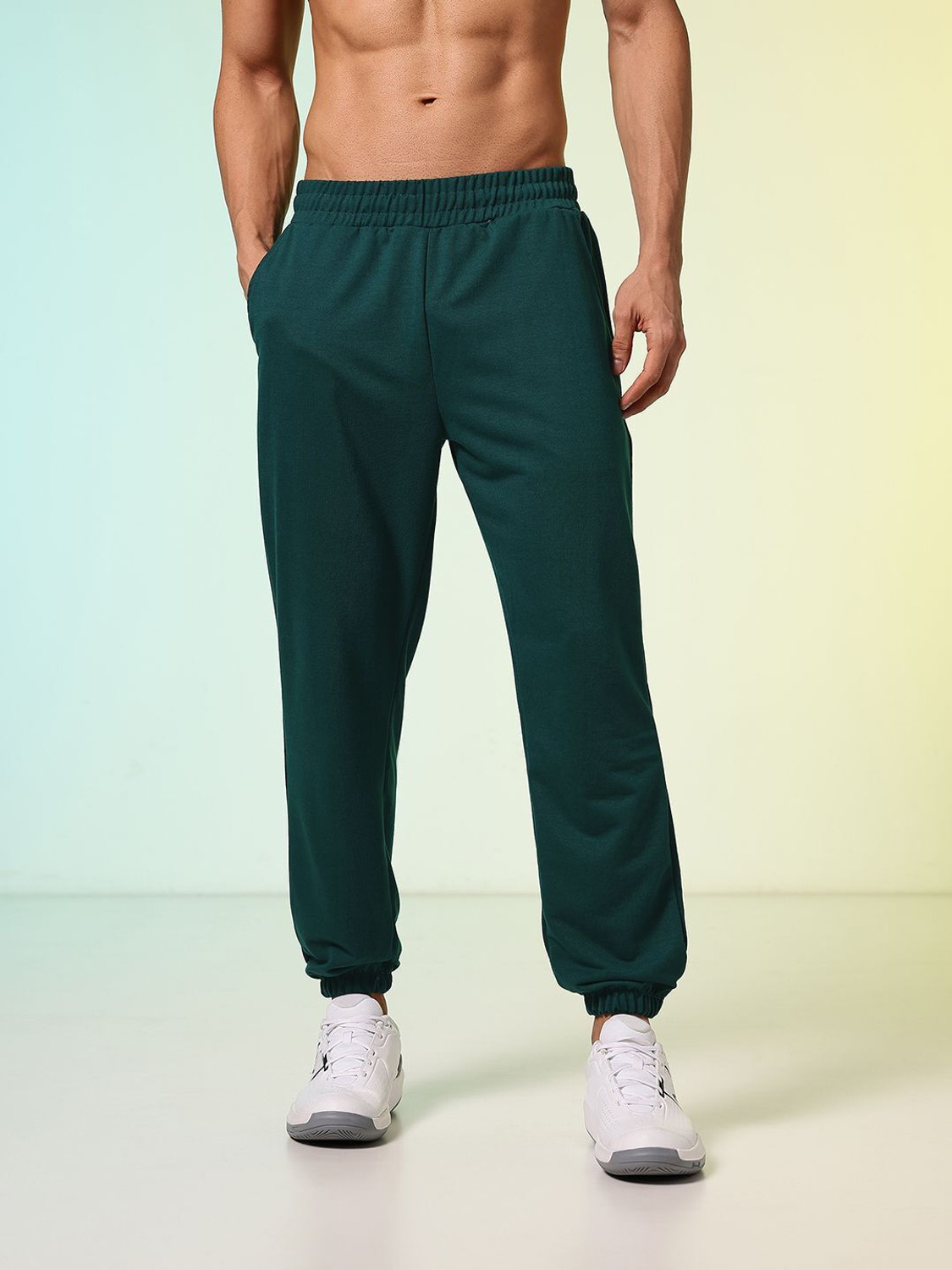 Image of HRX by Hrithik Roshan Solid Men Green Track Pants