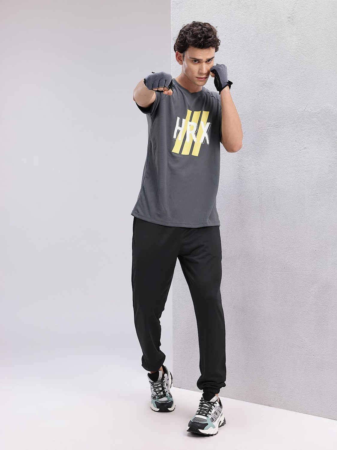 Image of HRX by Hrithik Roshan Self Design Men Black Track Pants