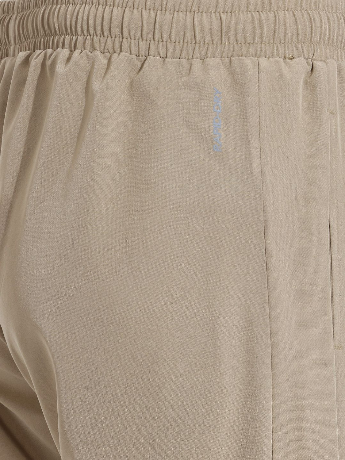 Image of HRX by Hrithik Roshan Men Self Design Beige Track Pants