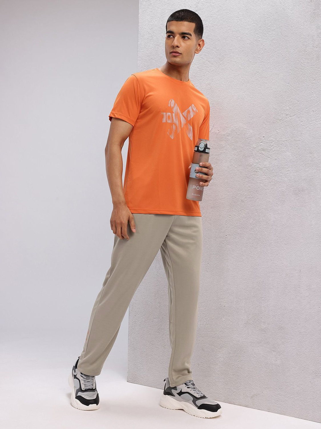 Image of HRX by Hrithik Roshan Solid Men Beige Track Pants