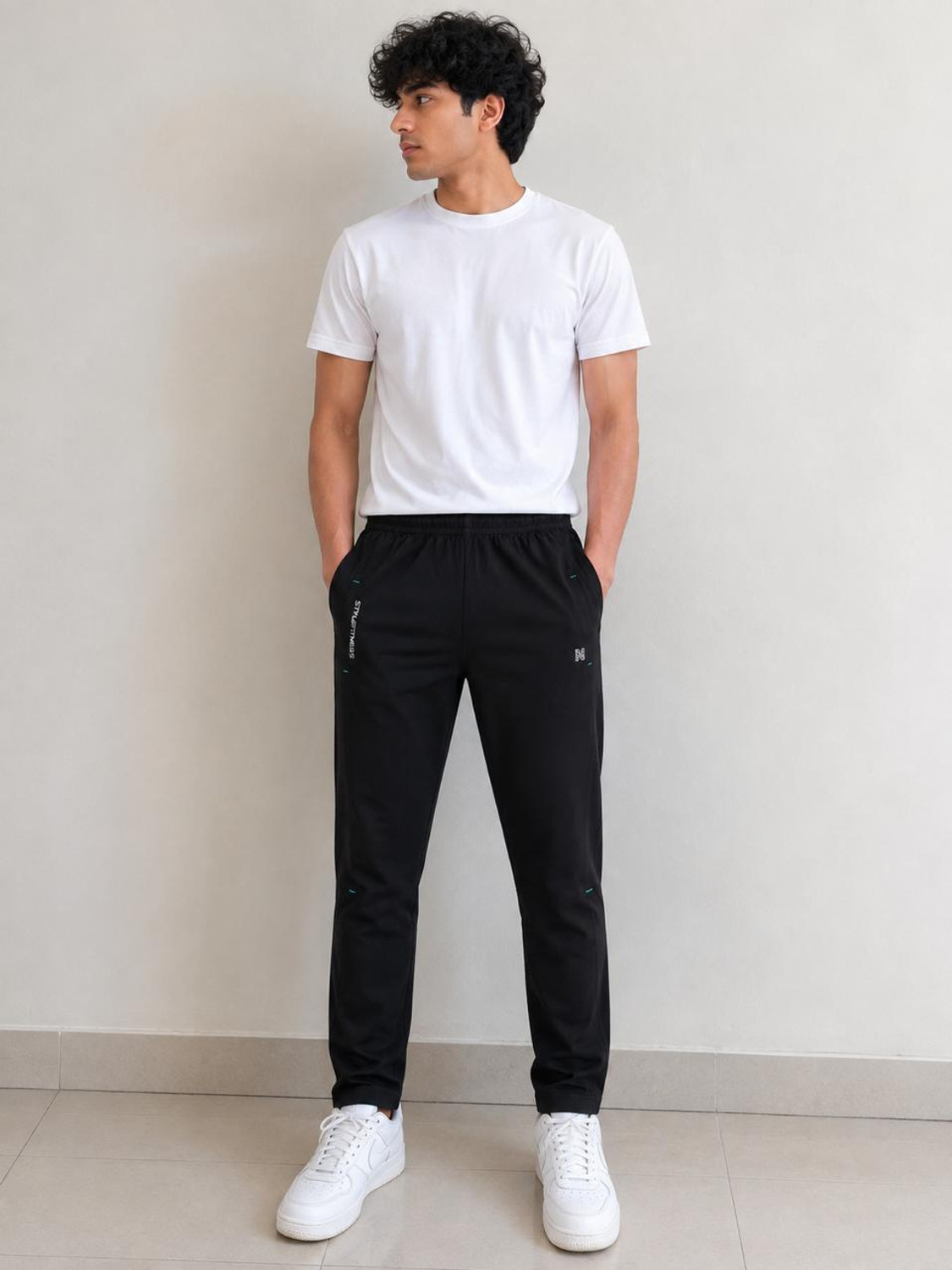 Image of NNN Solid Men Black Track Pants