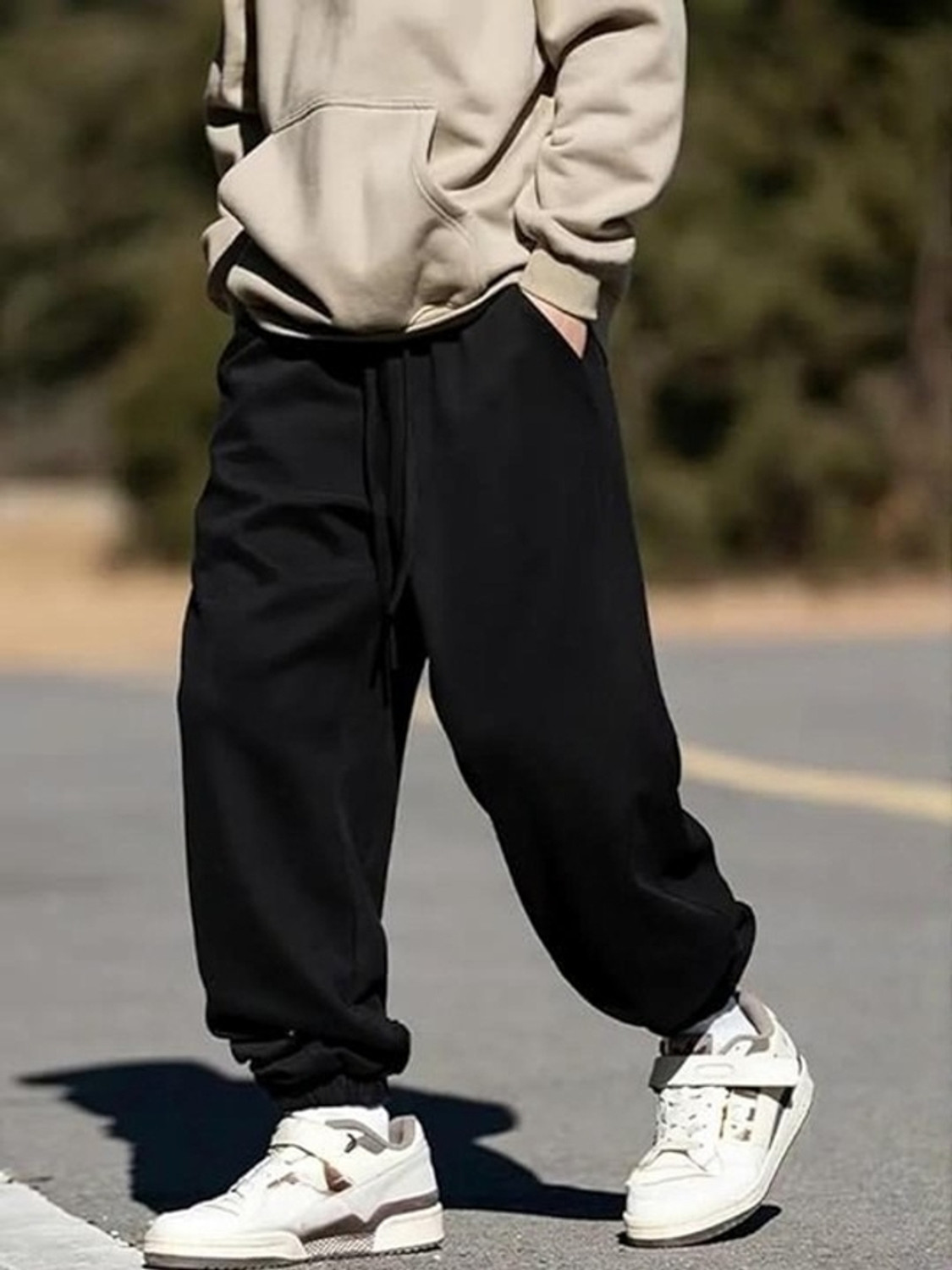 Image of Pricha Solid Men Black Track Pants