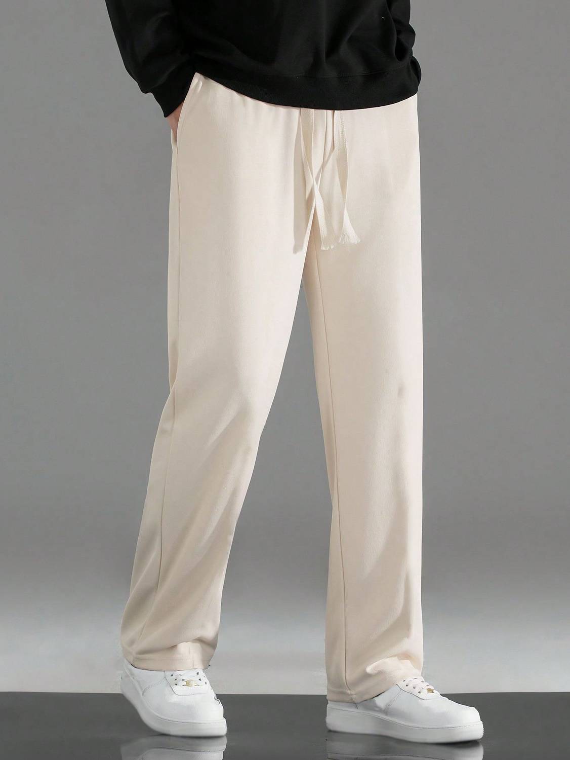 Adokedo Solid Men Beige Track Pants