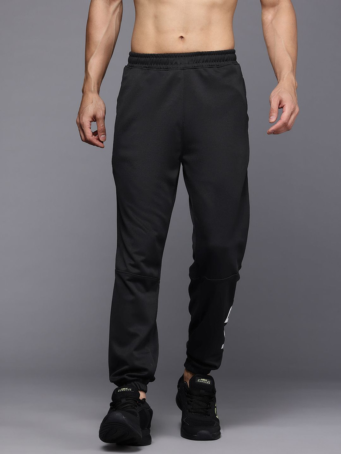 Image of HRX by Hrithik Roshan Printed Men Black Track Pants