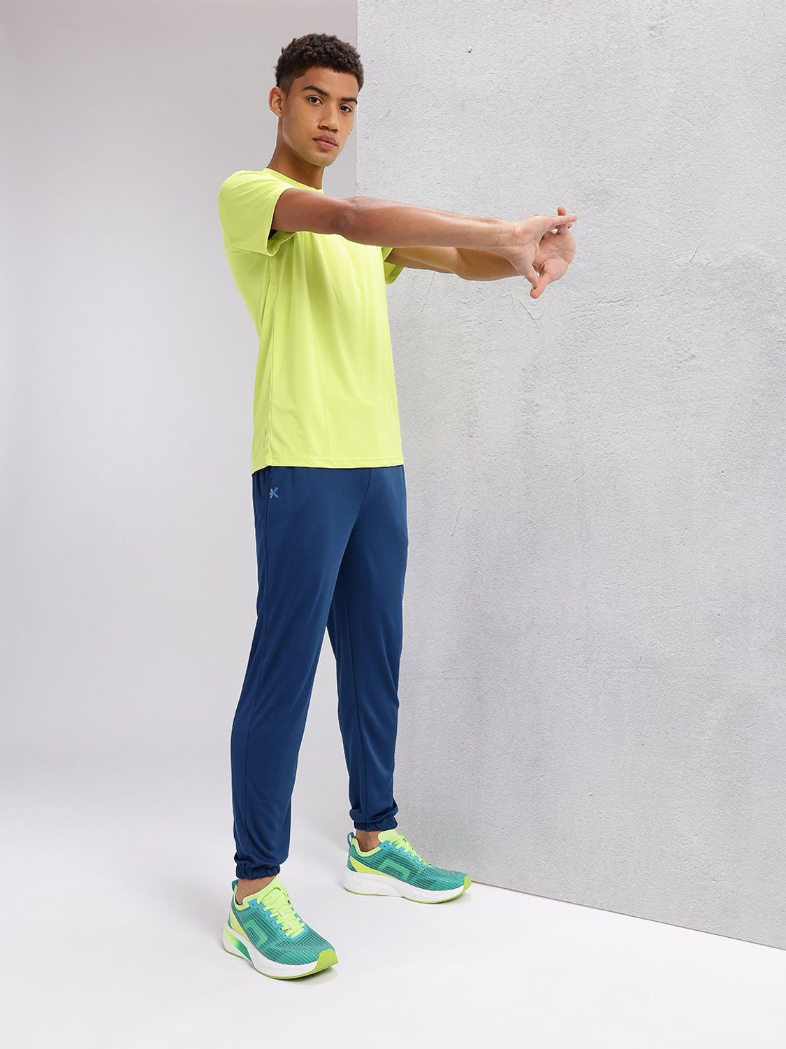 Image of HRX by Hrithik Roshan Solid Men Blue Track Pants