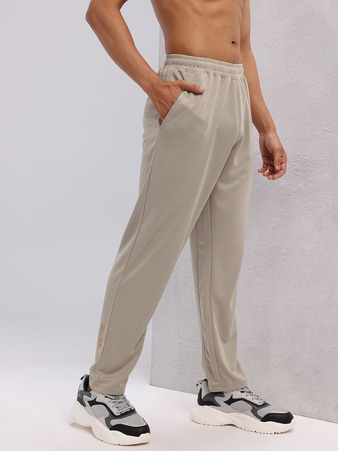 Image of HRX by Hrithik Roshan Solid Men Beige Track Pants