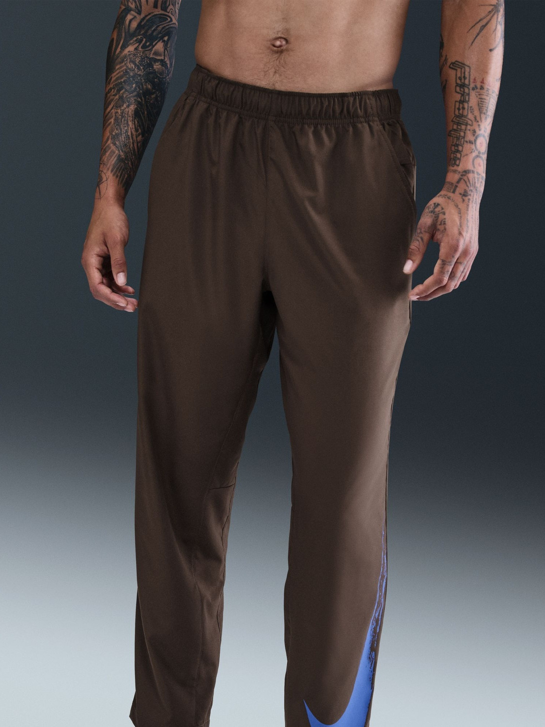 Image of NIKE Solid Men Brown Track Pants