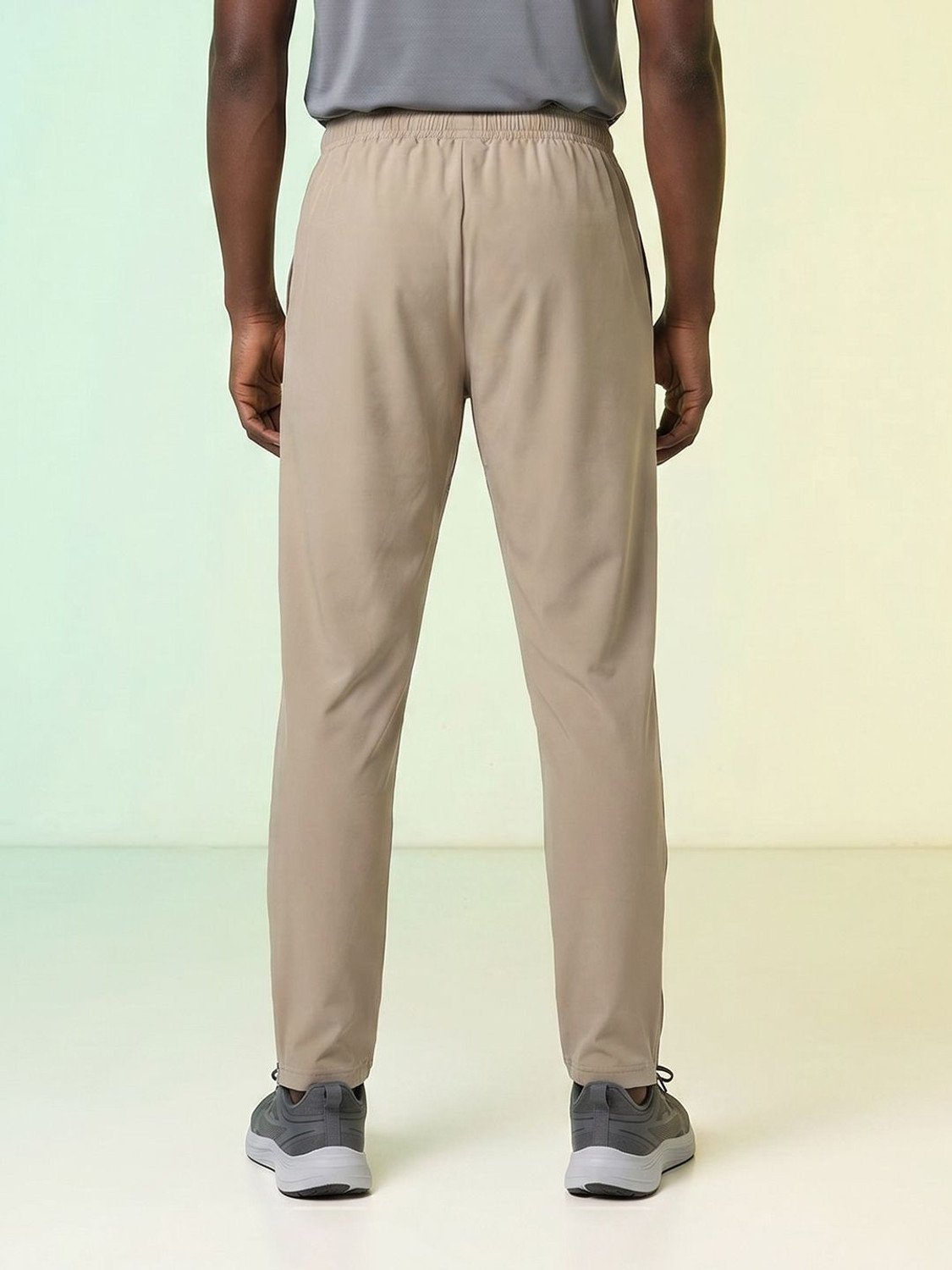 Image of HRX by Hrithik Roshan Men Self Design Beige Track Pants