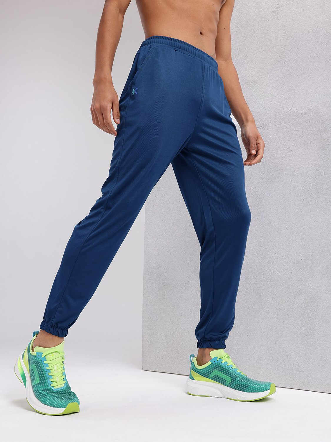 Image of HRX by Hrithik Roshan Solid Men Blue Track Pants