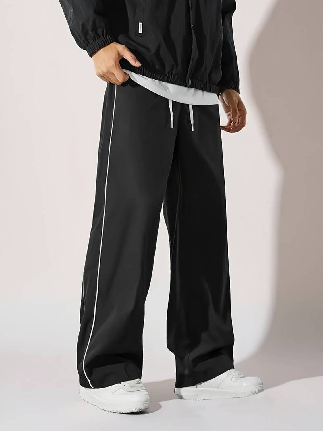 Paralians Men Black Track Pants - Image 1