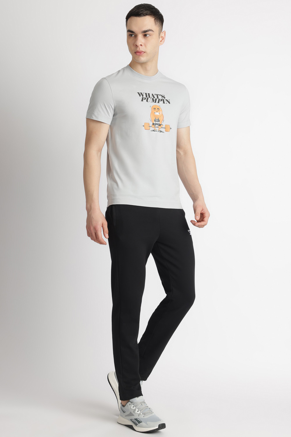 Image of REEBOK Solid Men Black Track Pants