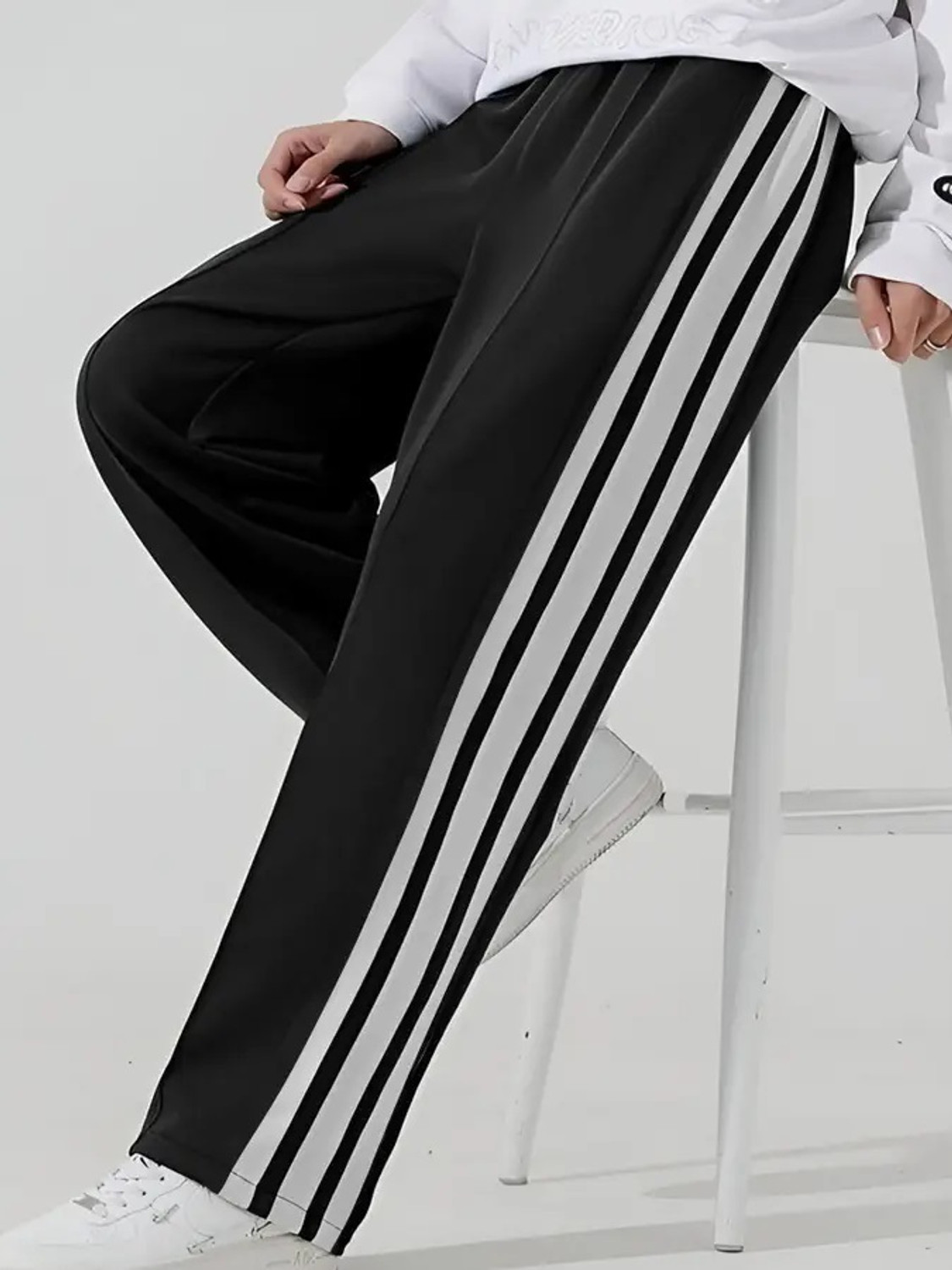 Image of Jump Cuts Striped Men Black Track Pants