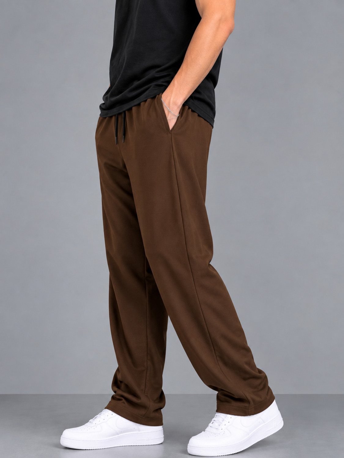 Image of FUBACK Men Solid Brown Track Pants