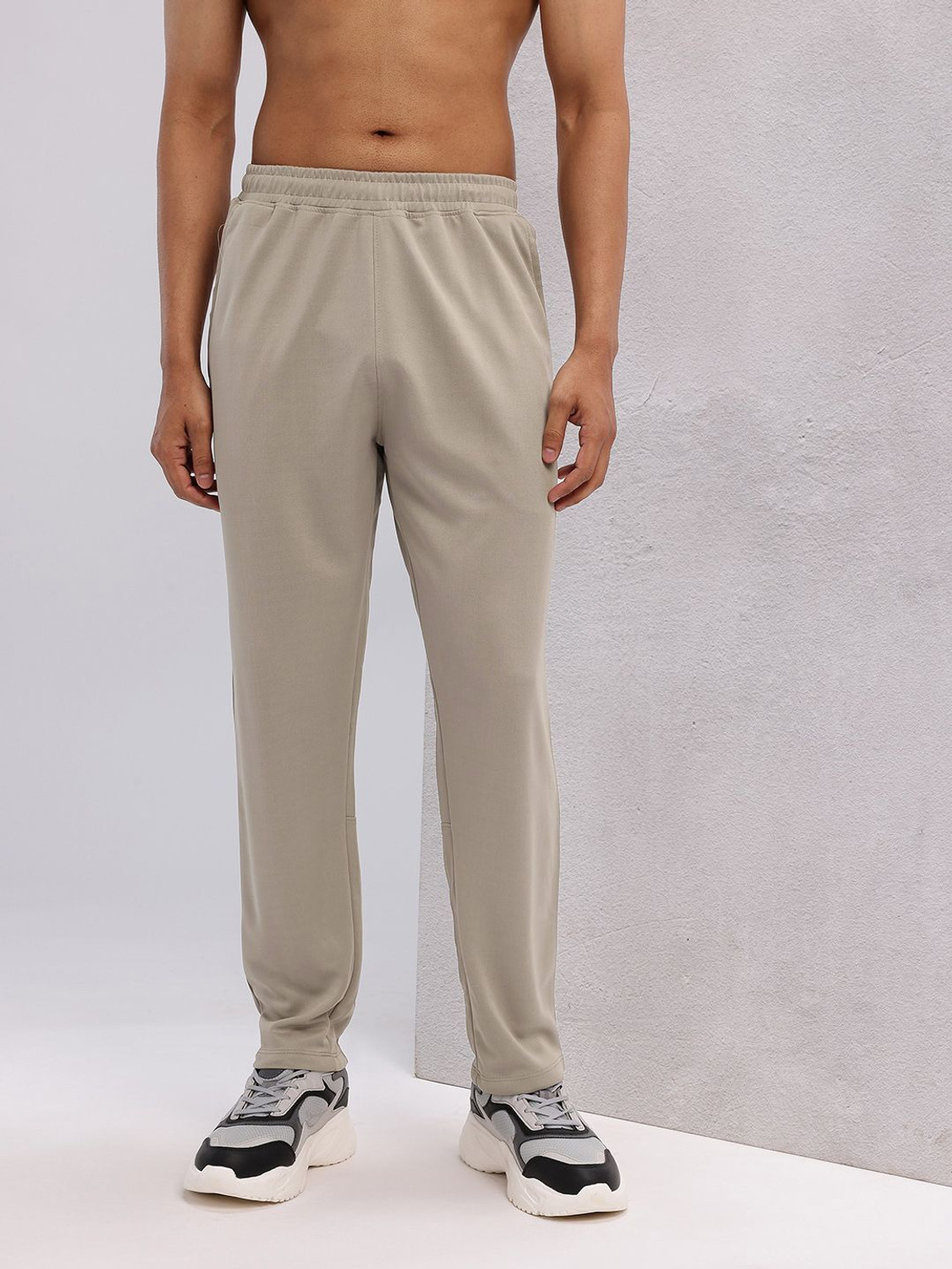 Image of HRX by Hrithik Roshan Solid Men Beige Track Pants