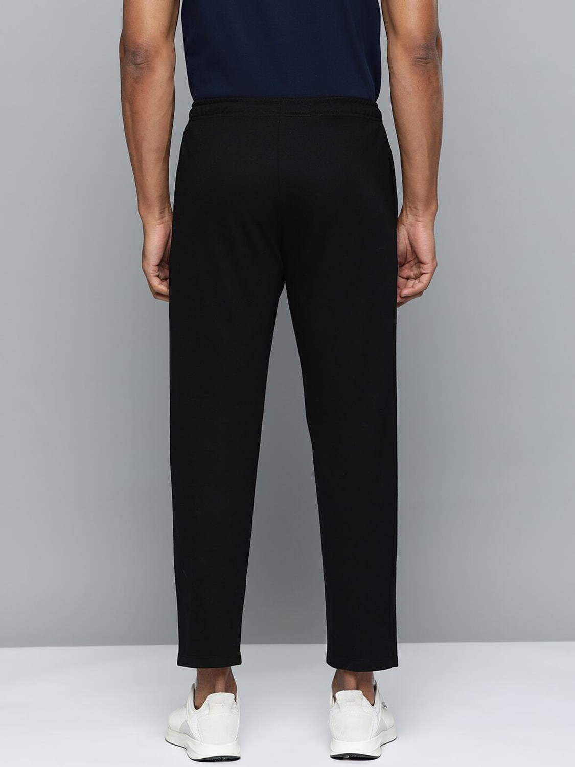 Image of HRX by Hrithik Roshan Men Solid Black Track Pants