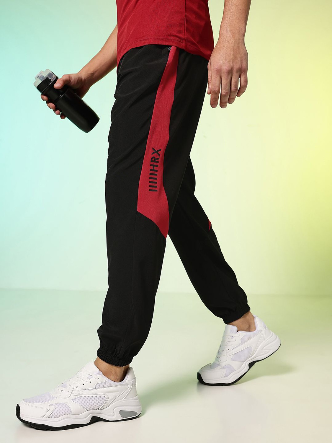 Image of HRX by Hrithik Roshan Men Printed Black Track Pants