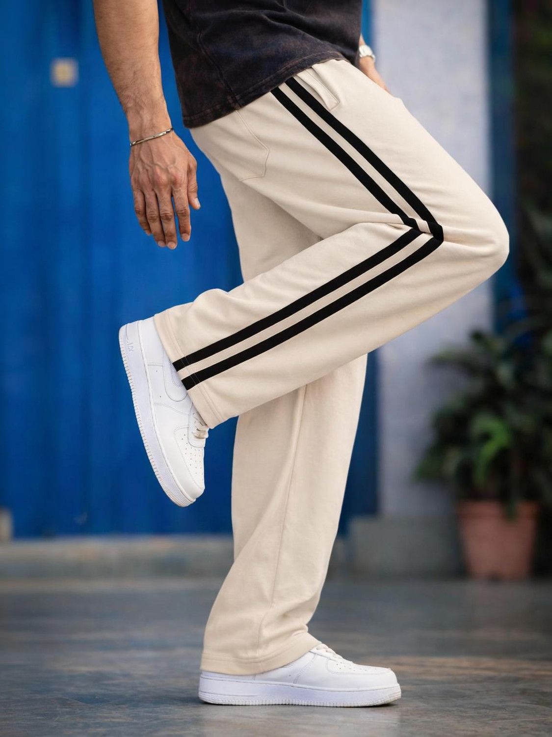 Image of FUBACK Men Solid Beige Track Pants