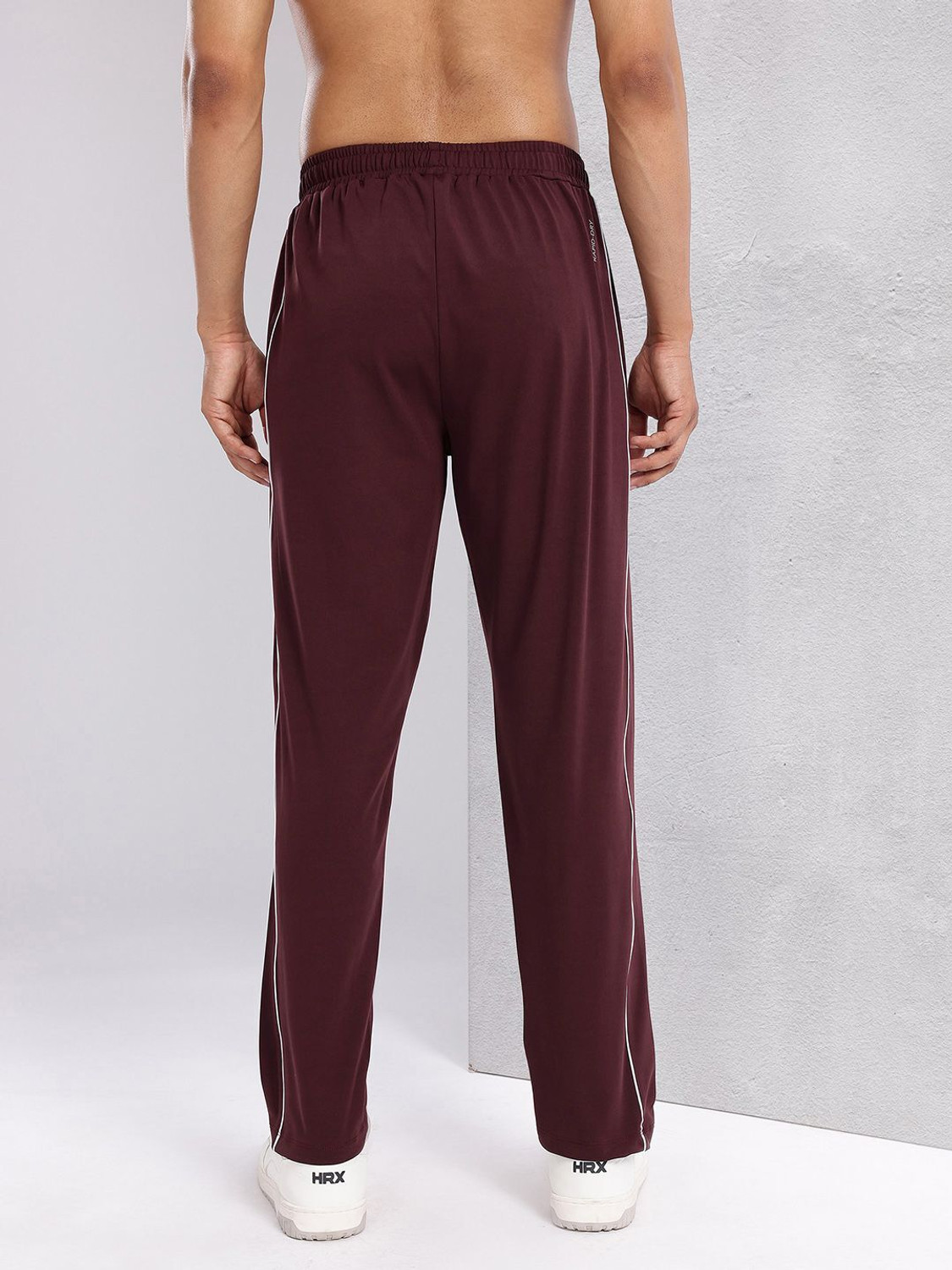 Image of HRX by Hrithik Roshan Striped Men Black Track Pants