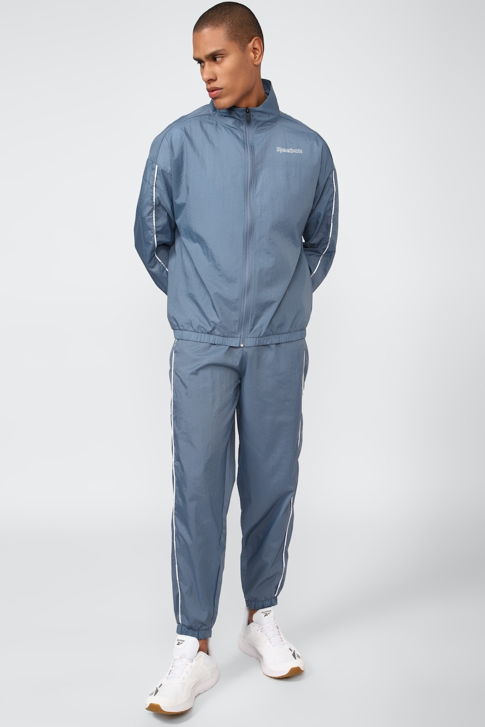 Image of REEBOK Solid Men Track Suit