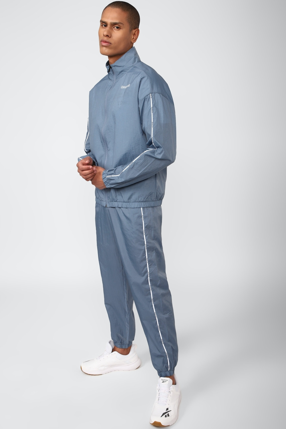 Image of REEBOK Solid Men Track Suit