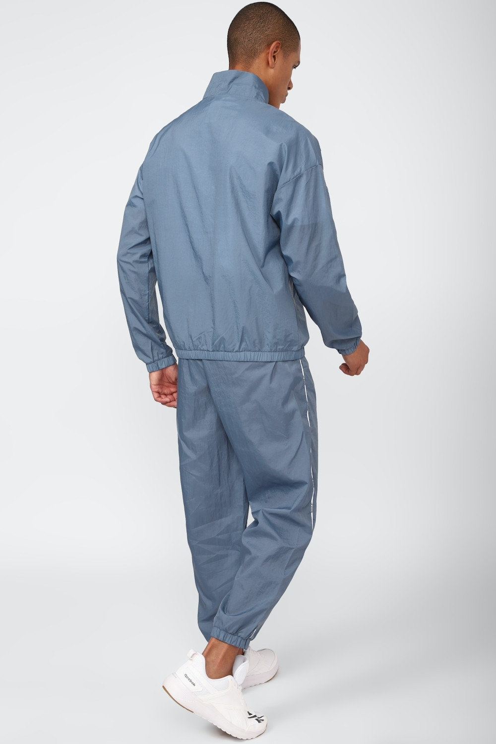 Image of REEBOK Solid Men Track Suit