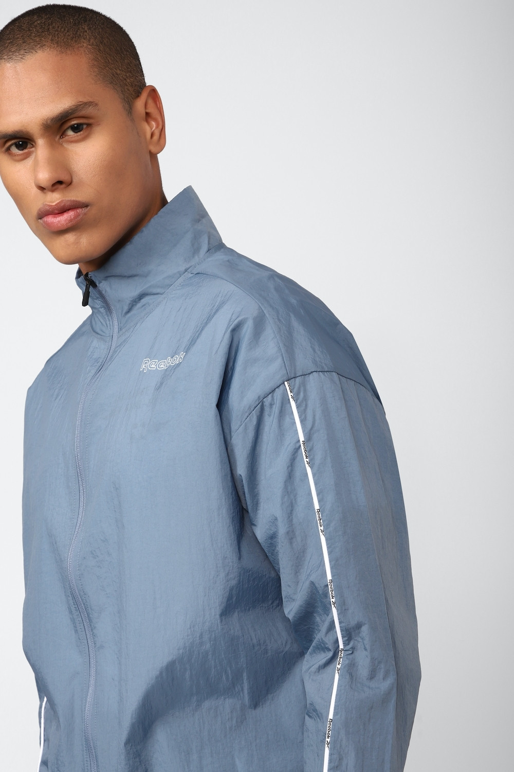 Image of REEBOK Solid Men Track Suit