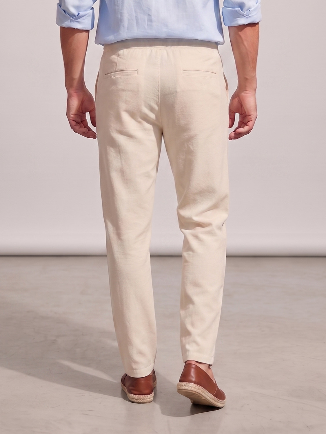 Image of woomny Regular Fit Men Cream Trousers