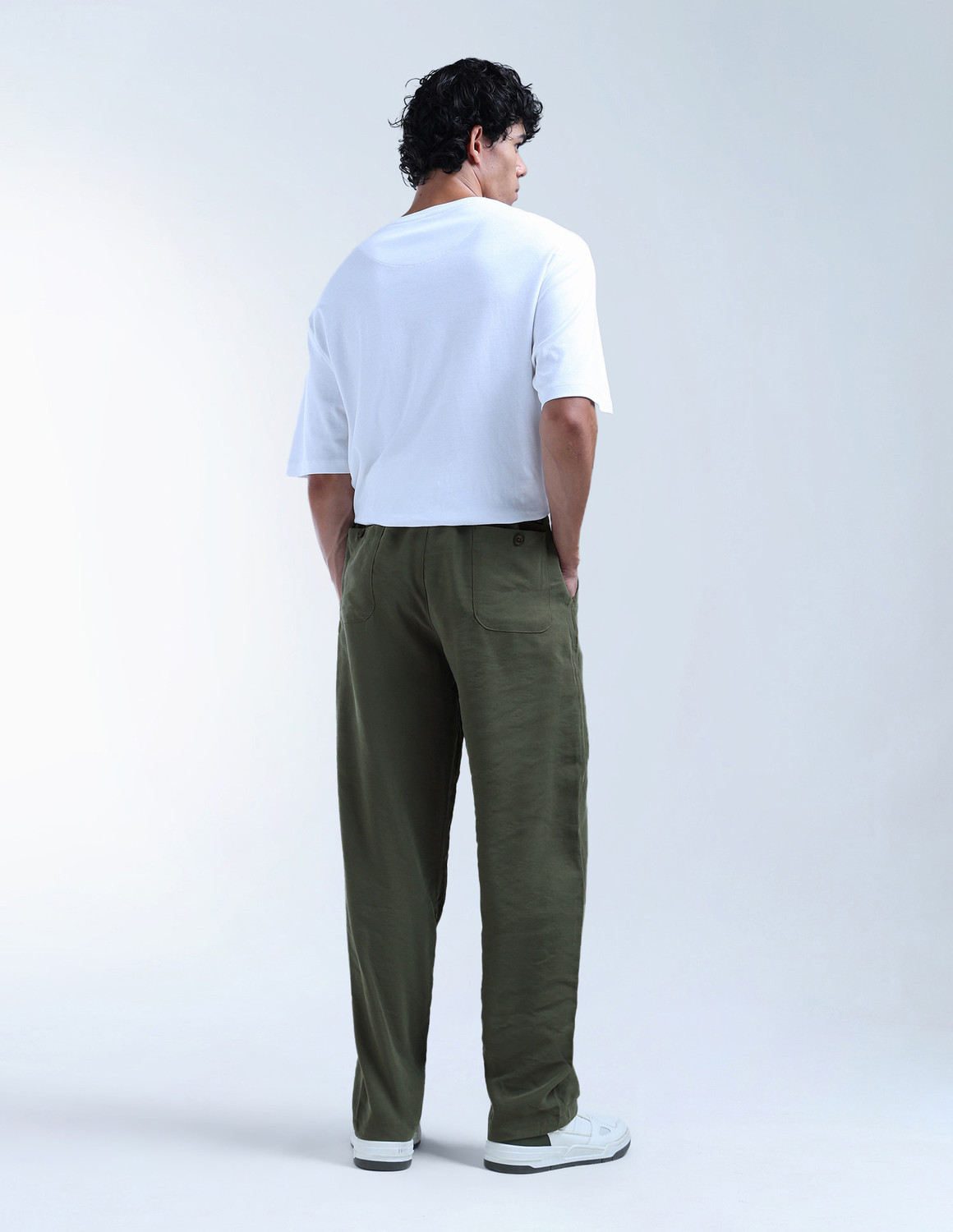 Image of FLYING MACHINE Loose Fit Men Green Trousers