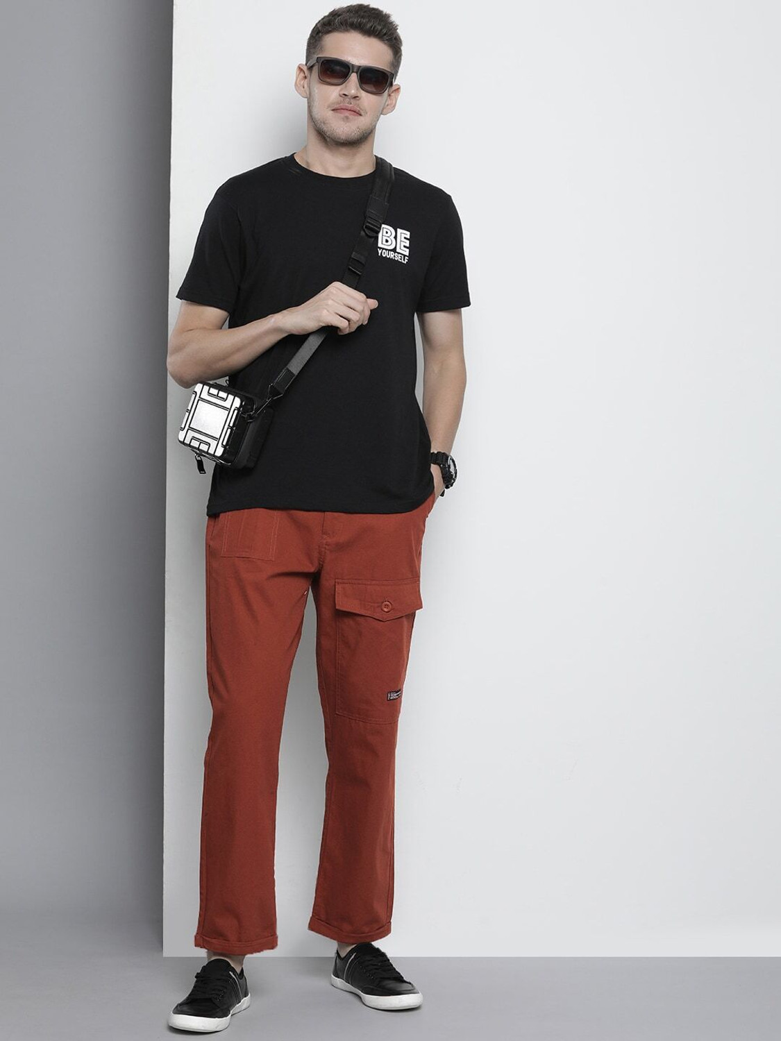 Image of The Indian Garage Co. Regular Fit Men Orange Trousers
