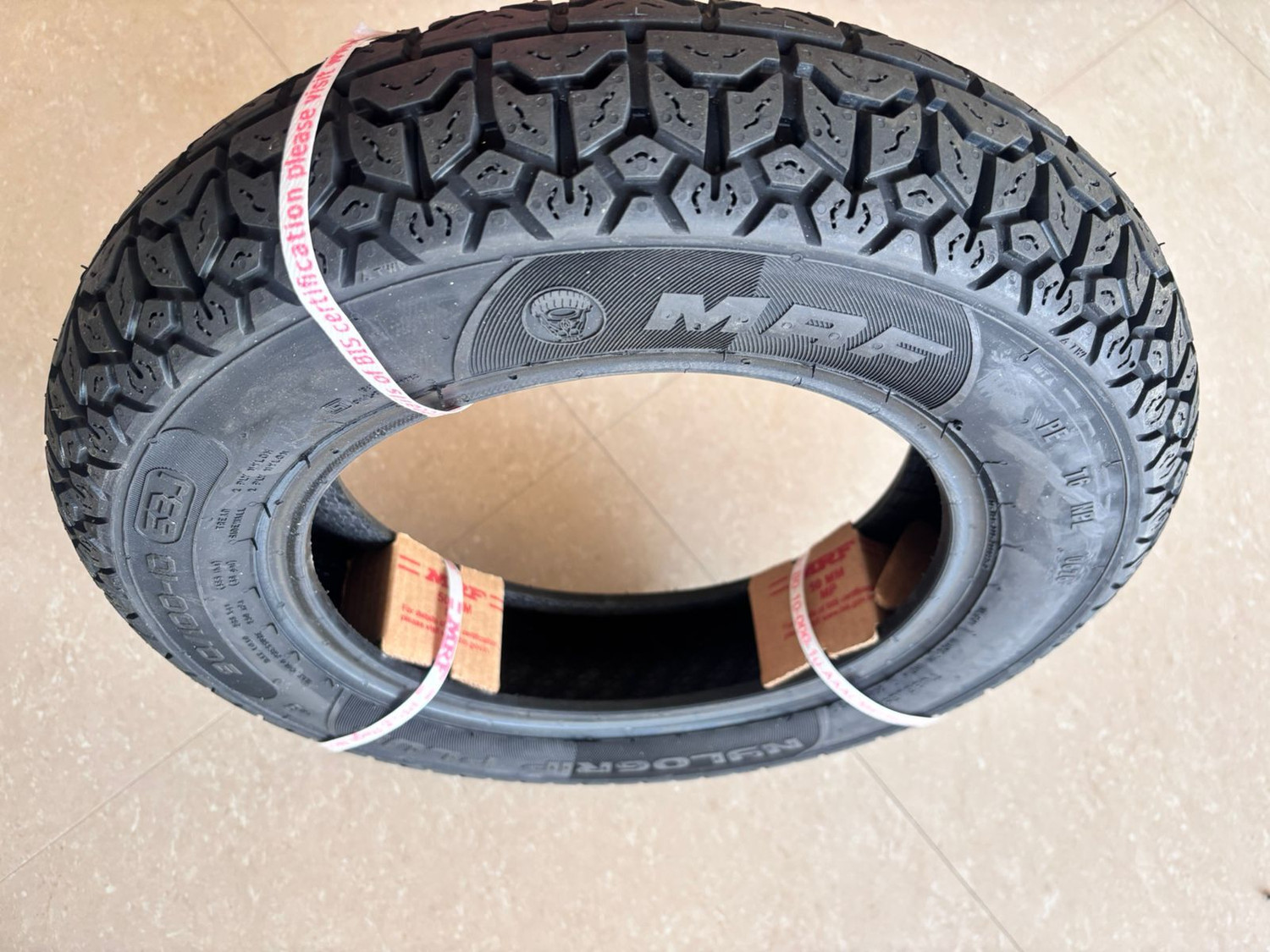 Image of MRF 90 /100-10 53J NYLOGRIP PLUS TUBELESS TYRES 90 /100-10 53J NYLOGRIP PLUS TYRE Rear Two Wheeler Tyre