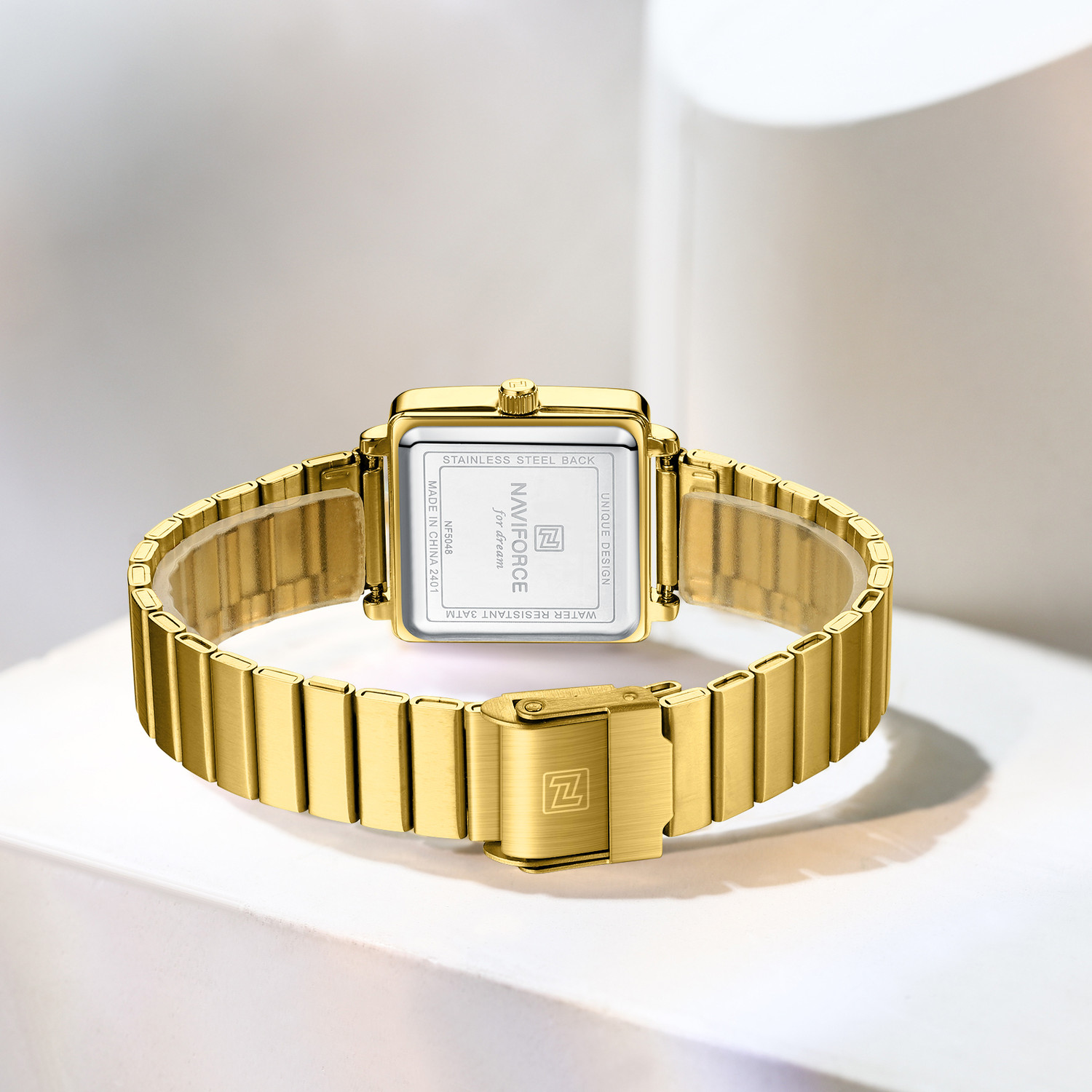 Image of NAVIFORCE NF5048 Modern White sunburst pattern square dial with gold Strap Analog Watch - For Women
