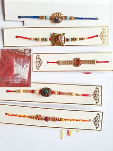 Unikstop Designer 202738 Mauli Thread Chawal Roli Pack, Rakhi Set Price ...