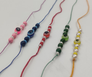 handmadearts Thread Combo of 5 Evil Eye Handmade Rakhi for Brother ...